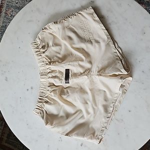 Fear Of God Essentials Cream Nylon Running Shorts